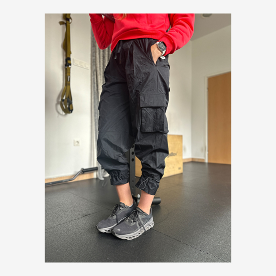 UNDER ARMOUR ž hlače 1386456-001 CRINKLE WOVEN PANTS black white