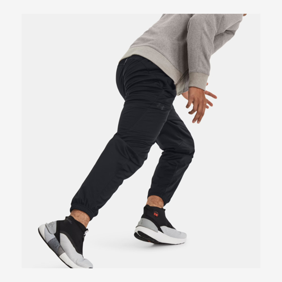 UNDER ARMOUR m hlače 1379803-001 UNSTOPPABLE BONDED JOGGERS black