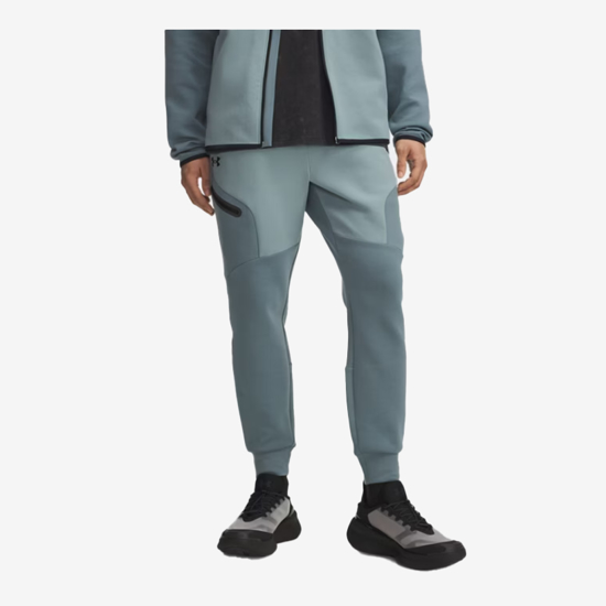 UNDER ARMOUR m hlače 1389353-587 UNSTOPPABLE FLEECE JOGGERS jasper blue serpentine black