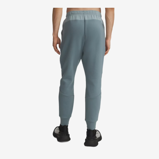 UNDER ARMOUR m hlače 1389353-587 UNSTOPPABLE FLEECE JOGGERS jasper blue serpentine black