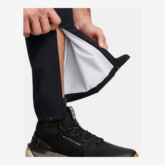 UNDER ARMOUR m golf hlače 1342718-002 RAIN GOLF PANTS black metallic silver