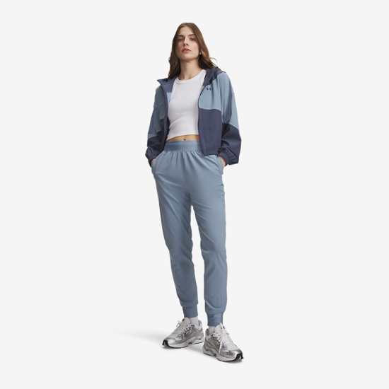 UNDER ARMOUR ž hlače 1382727-448 UA RIVAL HIGH-RISE WOVEN PANTS blue wind black